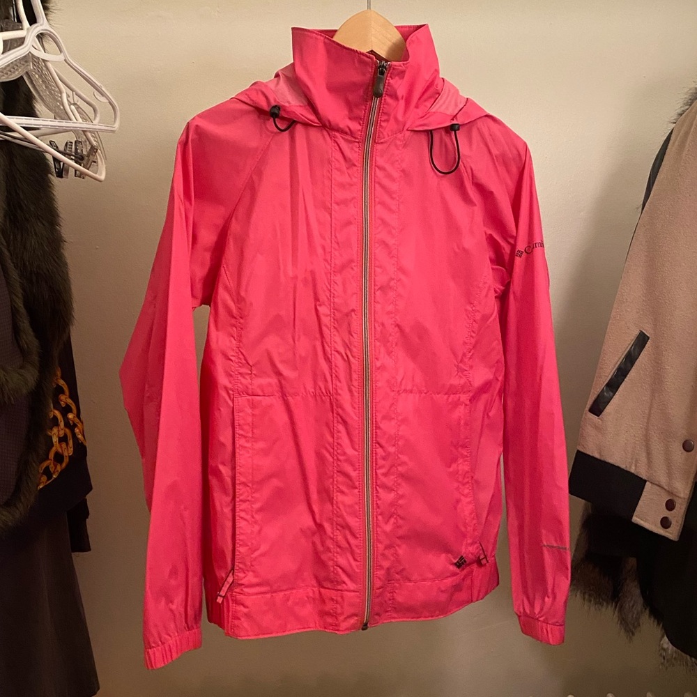 Hot pink Columbia wind breaker with roll up hood